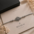 Dense Forest Flower Silver-Tone Rakhi